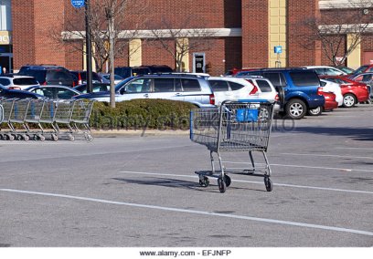 single-shopping-cart-in-walmart-parking-lot-efjnfp